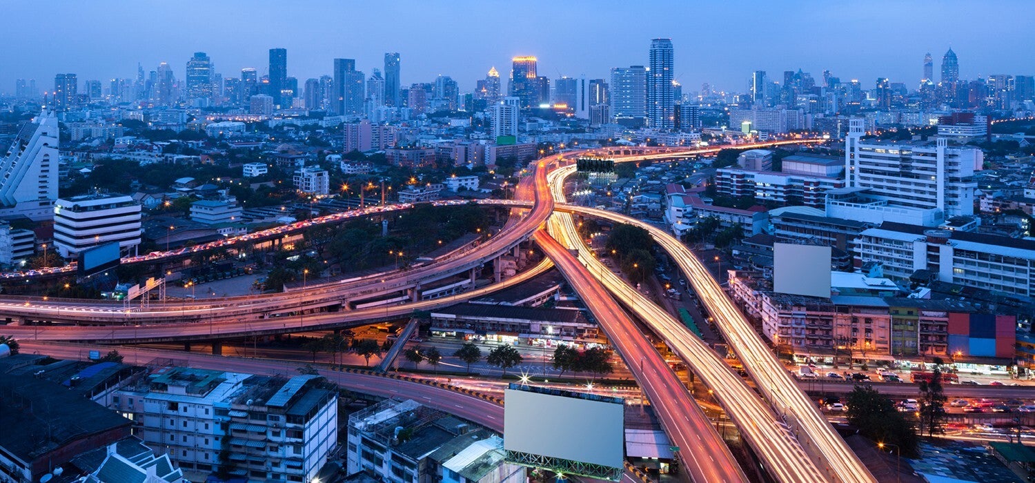 City skyline at dusk, the public services AI projects aim to improve